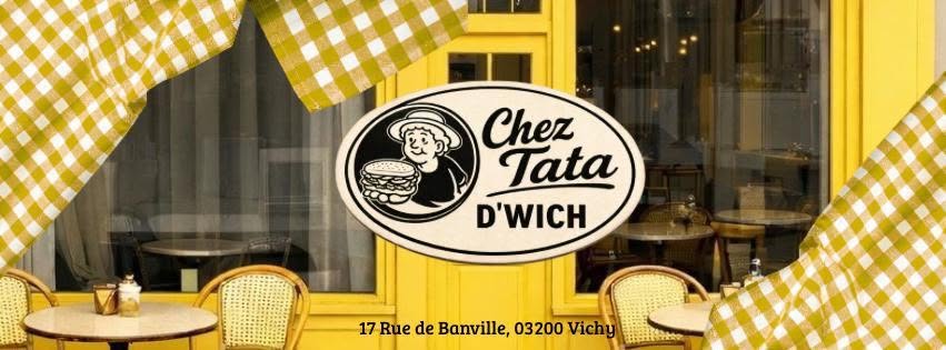 Devanture de Chez Tata Vichy avec sa bannière jaune emblématique